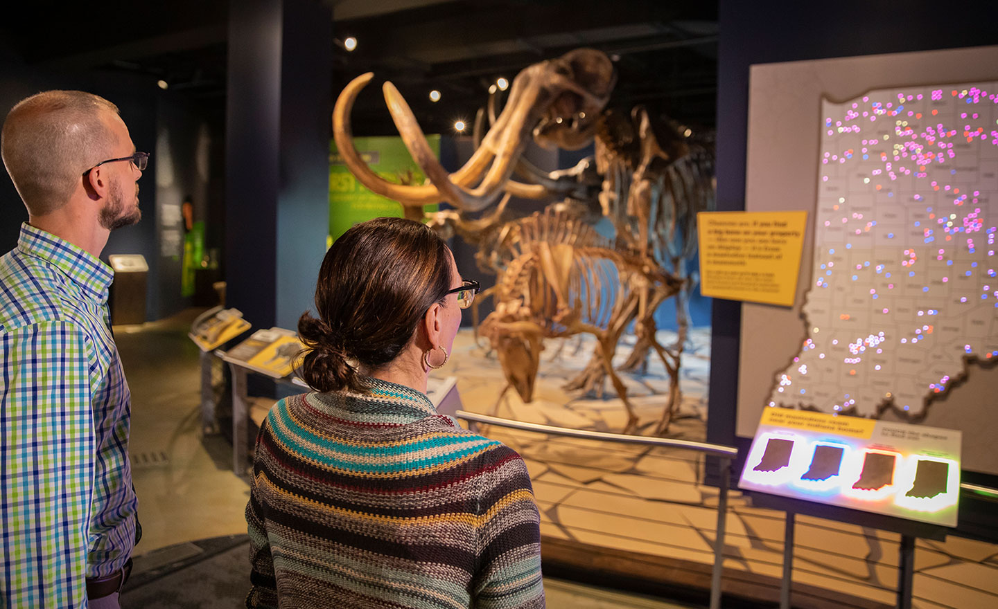 couple viewing skeletons