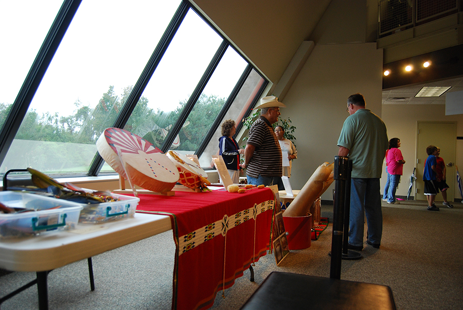 Visitors shopping at vendor tables