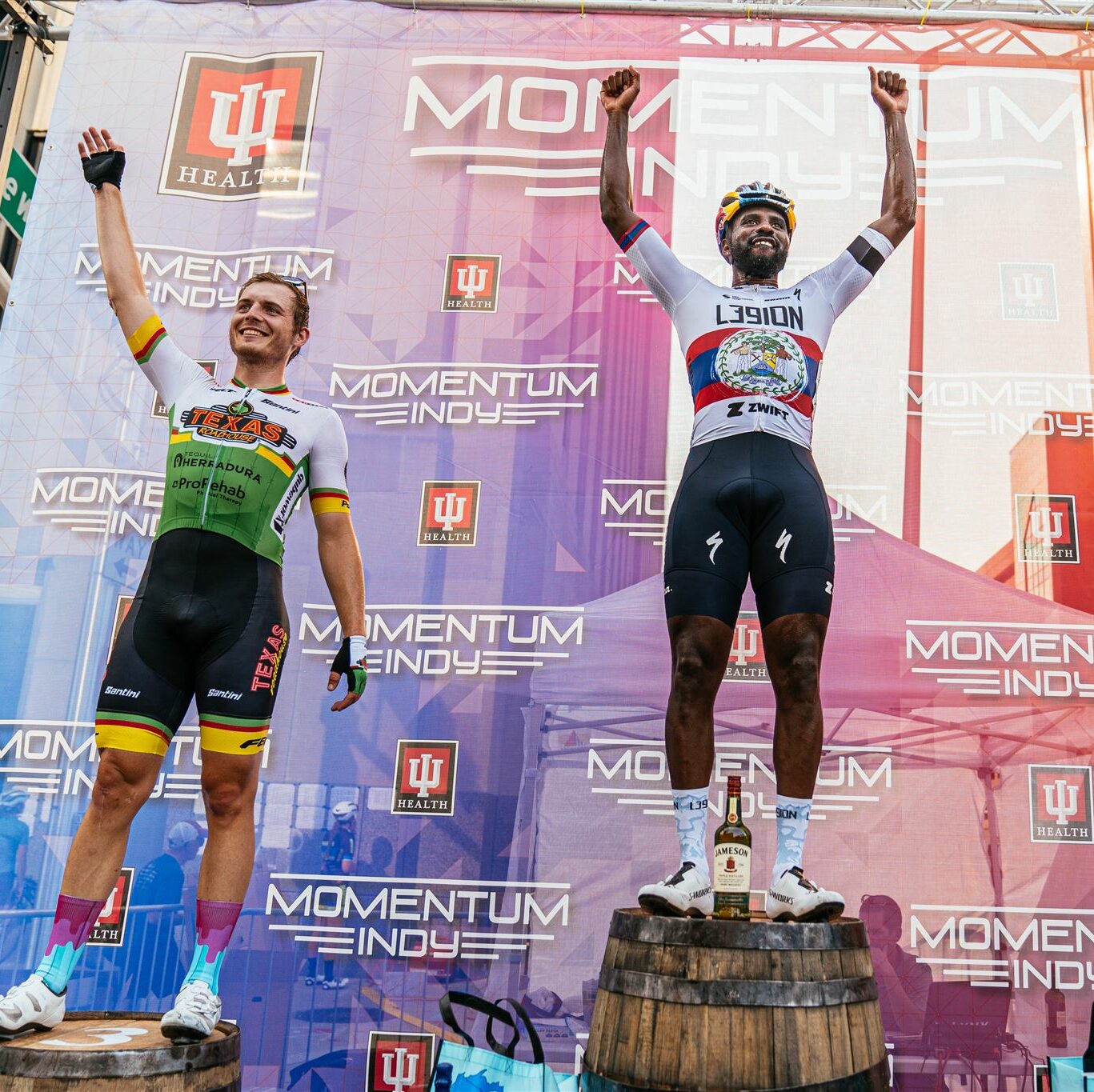 professional cyclists standing on podium