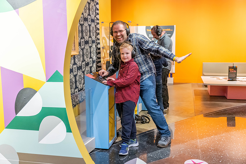 Visitors interacting in exhibit