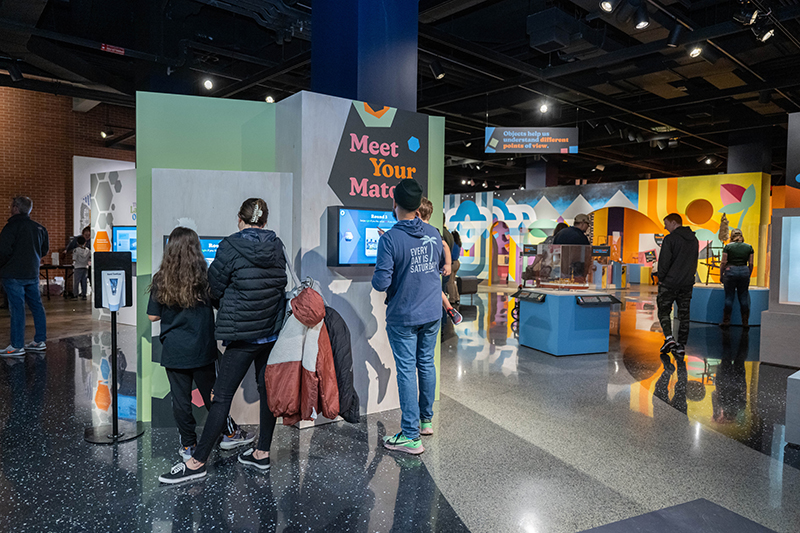 Visitors interacting in exhibit