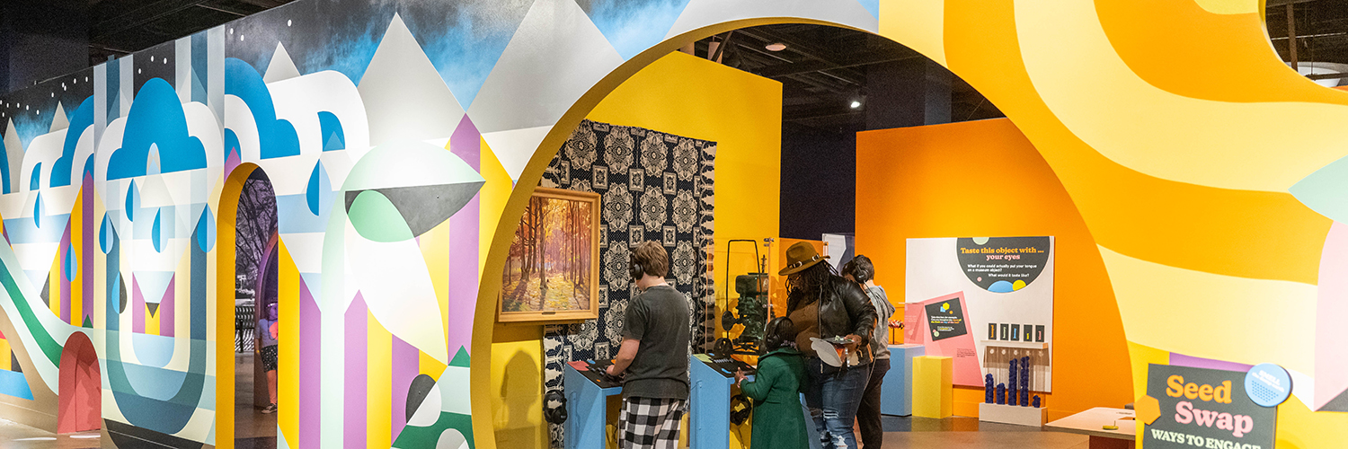 Visitors interacting in exhibit