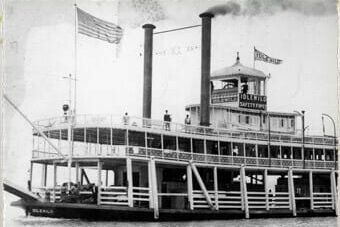 black and white image of riverboat