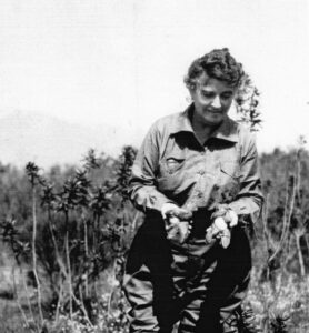 Gene Stratton-Porter standing in field