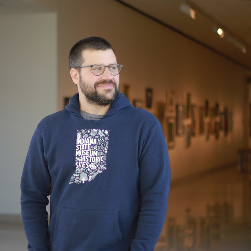 Man wearing blue ISMHS sweatshirt