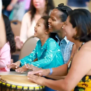 a family with drums at a juneteenth celebration