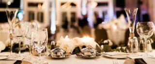 a closeup of a beautiful table arrangement for a wedding reception