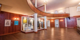 Display case in hallway of the Opera House at New Harmony