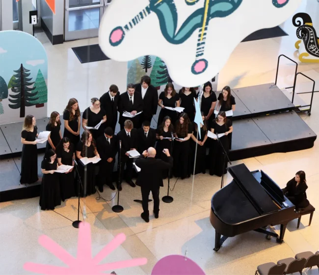 Aerial of kids singing Holiday Sounds